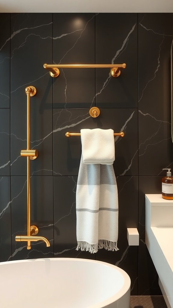 Elegant gold towel bars and hooks on a dark marble wall in a stylish bathroom.