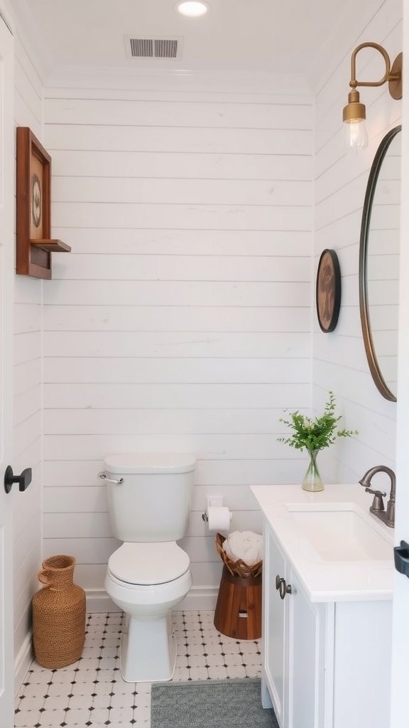 A small bathroom featuring shiplap walls, a pedestal sink, and cozy decor.